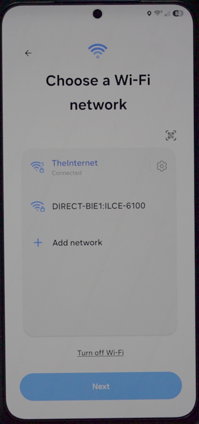 Choose a Wi-Fi network screen with the added network showing Connected